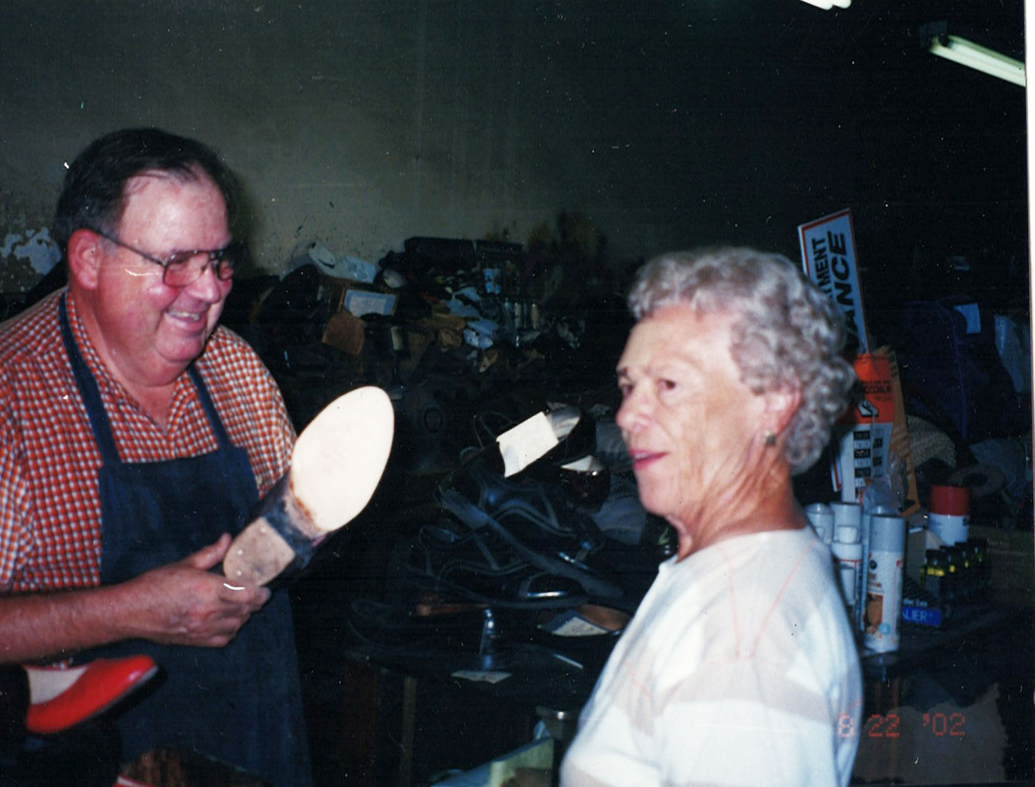 David Garner with John's Shoe Hospital customer 2002