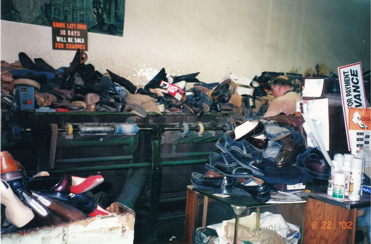 Shoe finisher in John's Shoe Hospital